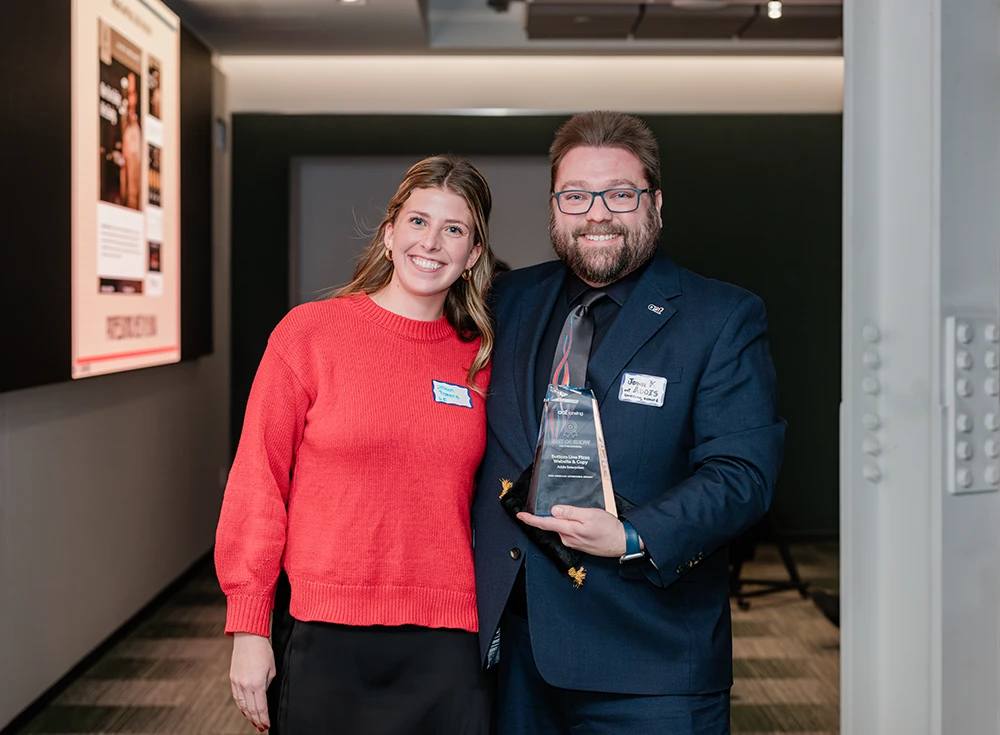Allison Pazera and John Addis showing off the Best in Show award